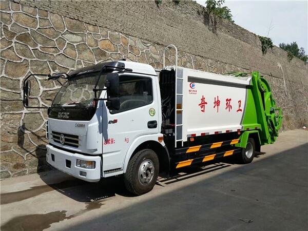 儋州市東風(fēng)多利卡垃圾處理車價(jià)格_勾臂式垃圾車錢垃圾車