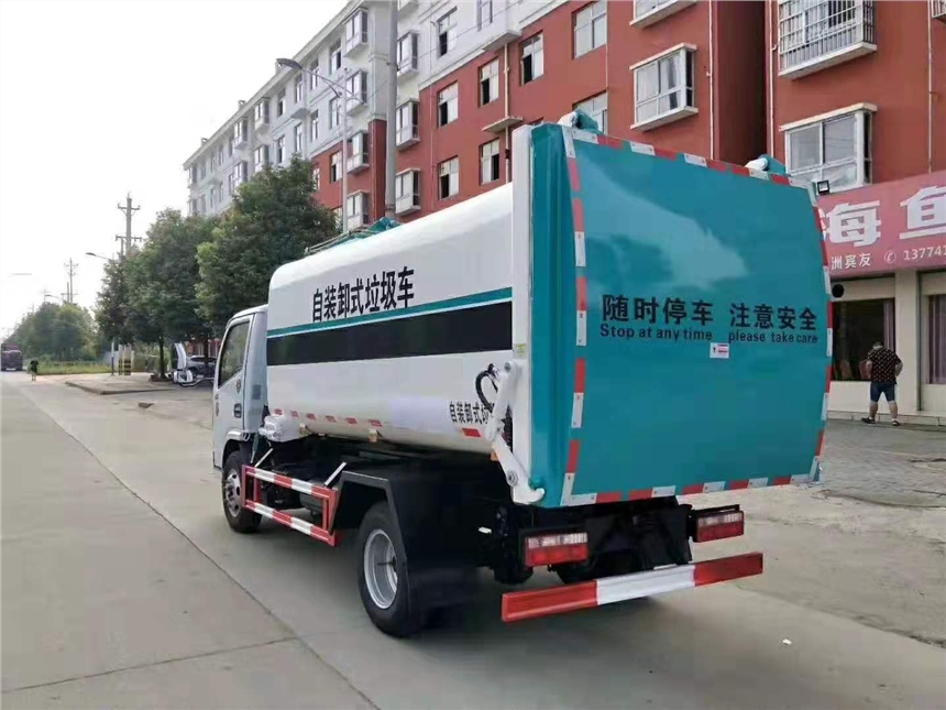 德州市翠巒區(qū)藍牌江淮7.5方側裝掛桶壓縮垃圾車供應